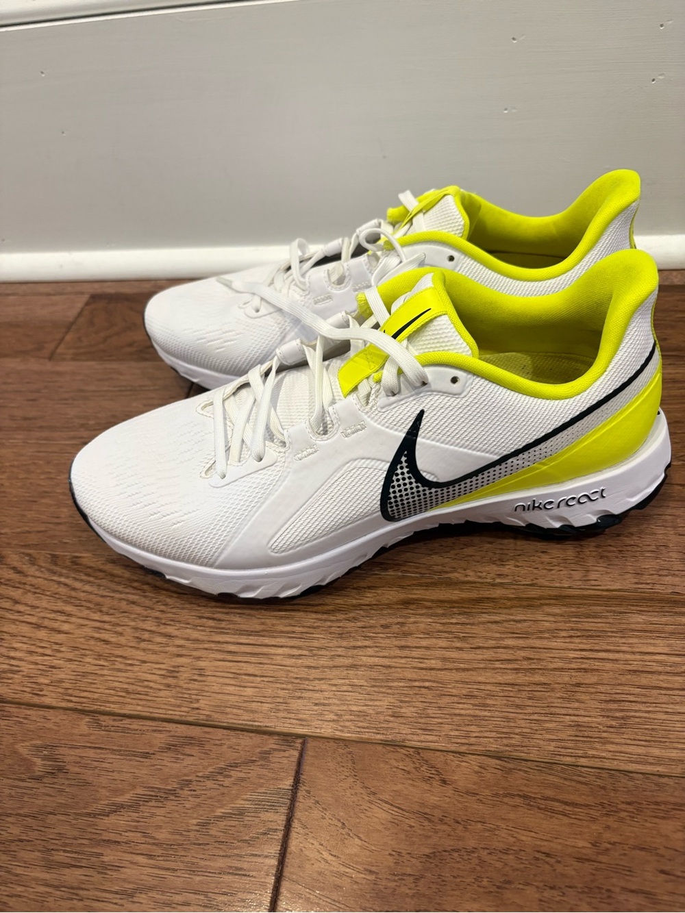 Nike White & Neon Yellow golf shoe or sneaker